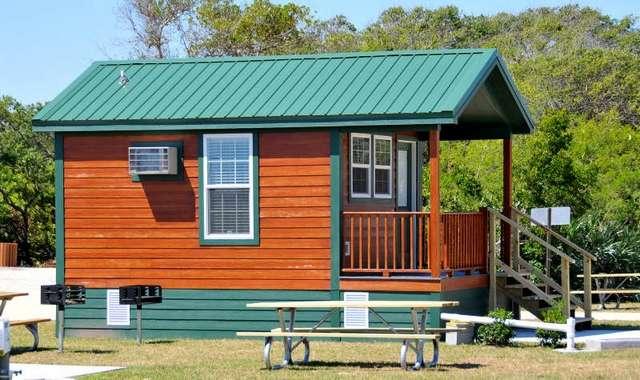 Want To Stay In An Air Conditioned Tiki Themed Cabin By The Sea