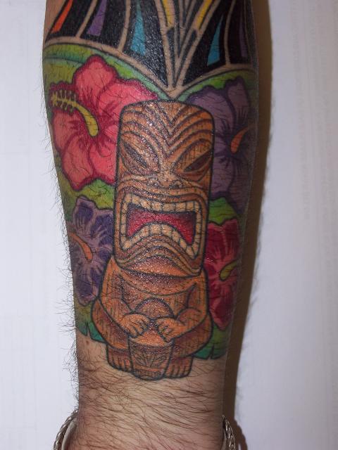 Does anyone have Tiki Tattoos?